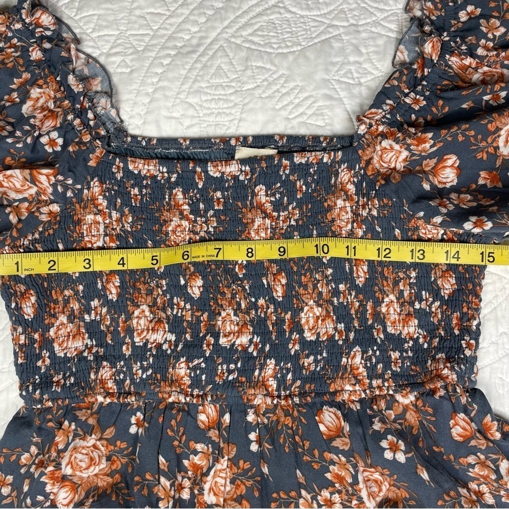 Blue Floral Smocked Babydoll Top by Listicle Size M
Puffed Sleeves Vintage Vibes - Picture 9 of 12
